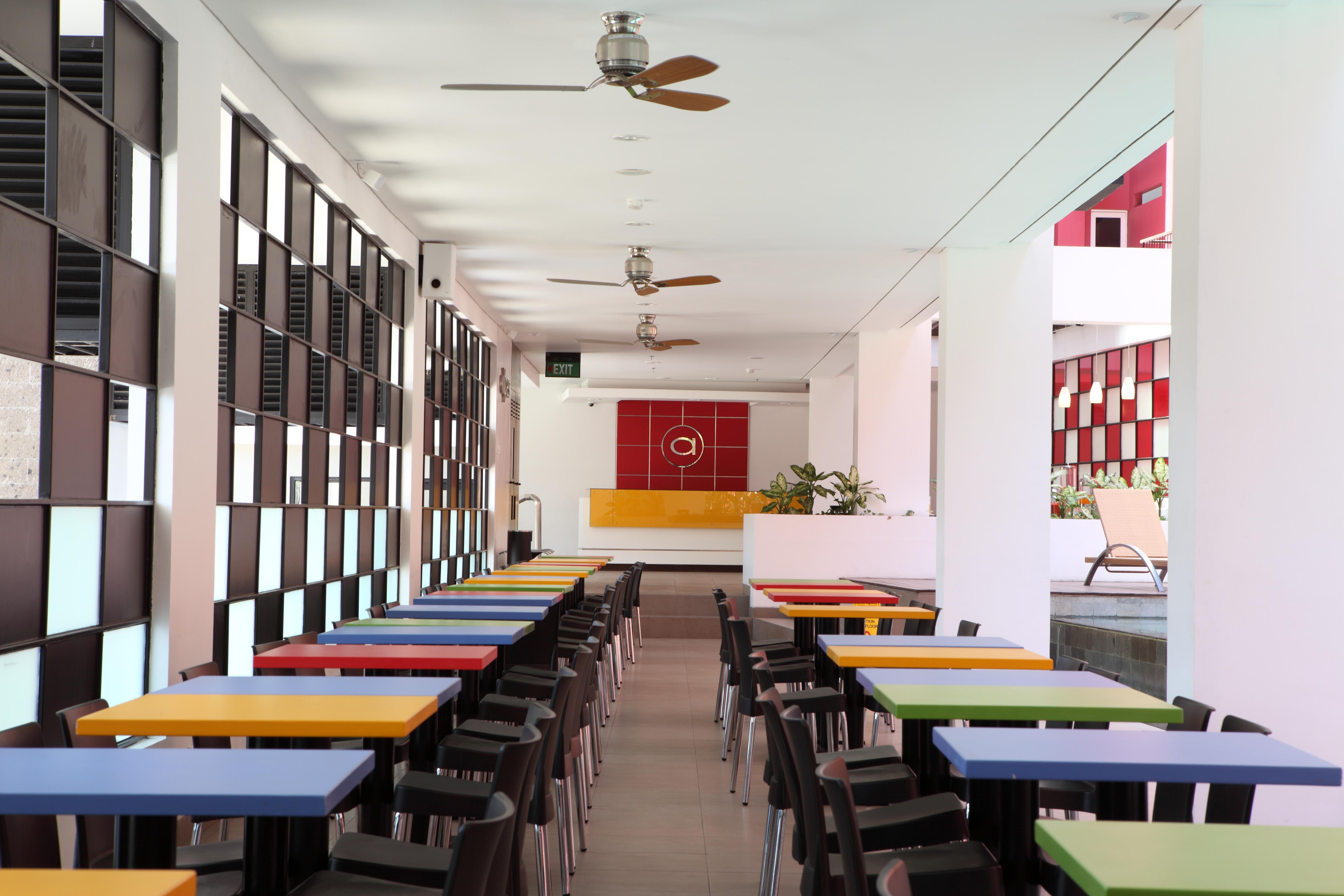 Kampi Hotel Legian Ресторан фото